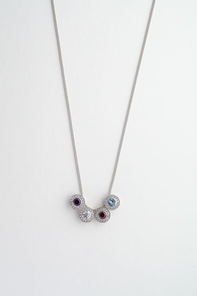Platinum Finish Sterling Silver Round Simulated Birthstone Pendant with Simulated Diamonds